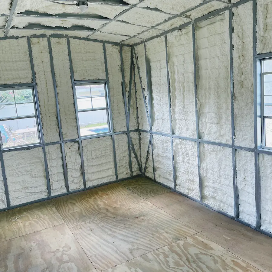 Closed-cell spray foam insulation applied to wall cavities in a residential project in Westampton